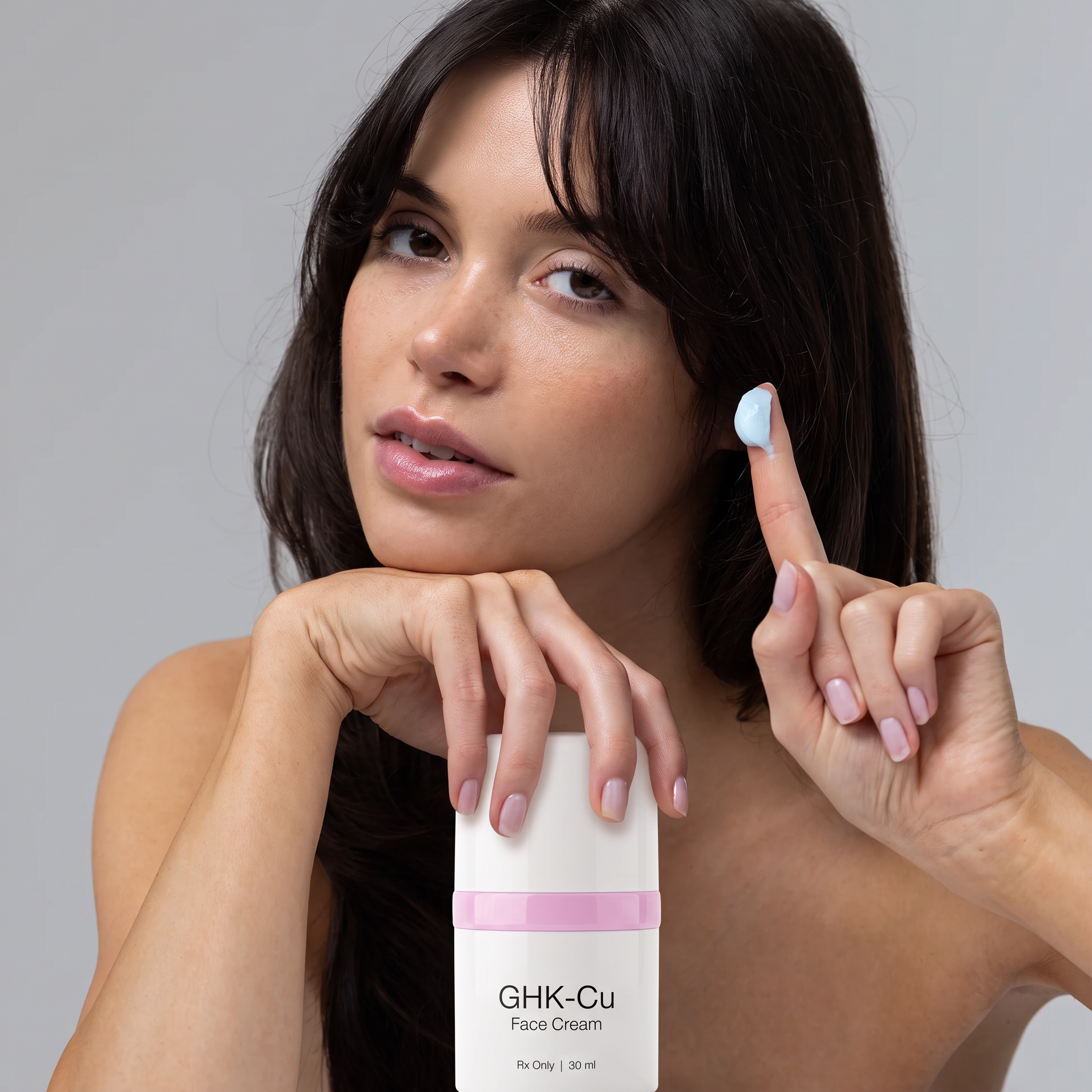 Woman holding the pep'd GHK-Cu Face Cream